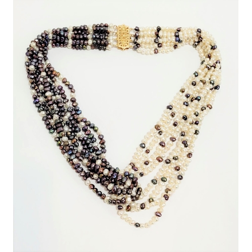 40 - A BEAUTIFUL & VERSATILE CASED PIECE OF JEWELLERY - A MULTI STRAND NATURAL PEARL KNOT NECKLACE, with ... 