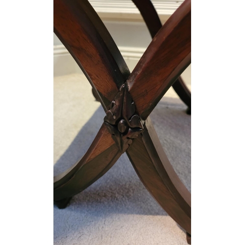 46 - A VERY FINE X-FRAME 19TH CENTURY FOOT STOOL, the top with embroided upholstery, the base made up of ... 