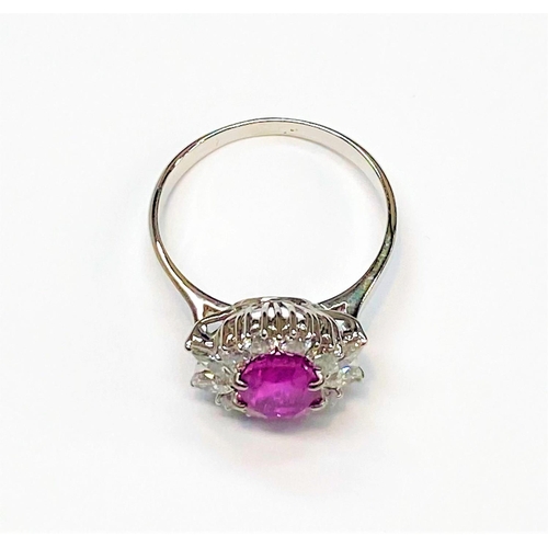 49 - A STUNNING 18CT WHITE GOLD BURMESE RUBY AND DIAMOND CLUSTER RING, beautiful oval cut Burmese ruby su... 