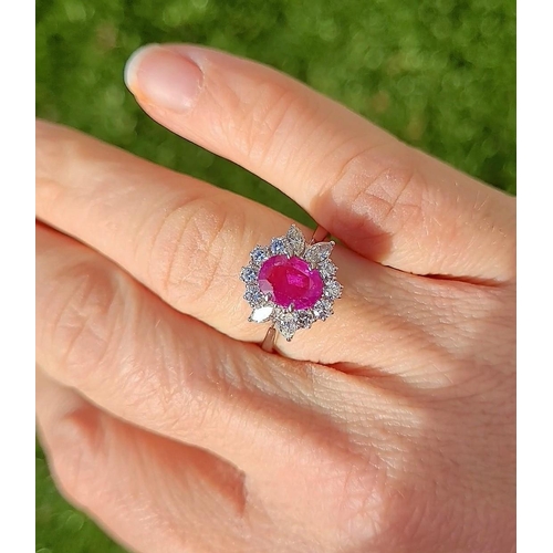 49 - A STUNNING 18CT WHITE GOLD BURMESE RUBY AND DIAMOND CLUSTER RING, beautiful oval cut Burmese ruby su... 