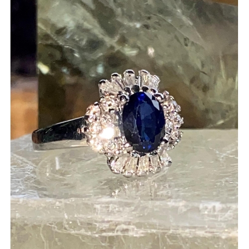 5 - A STUNNING 18CT WHITE GOLD CEYLON BLUE SAPPHIRE & DIAMOND BALLERINA RING, this piece of jewellery is... 