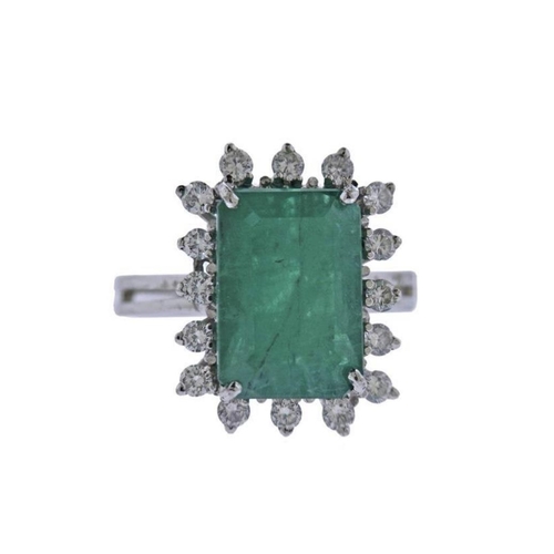 50 - A UNIQUE 18CT GOLD EMERALD AND DIAMOND CLUSTER RING, with beautiful 4.7ct central emerald surrounded... 