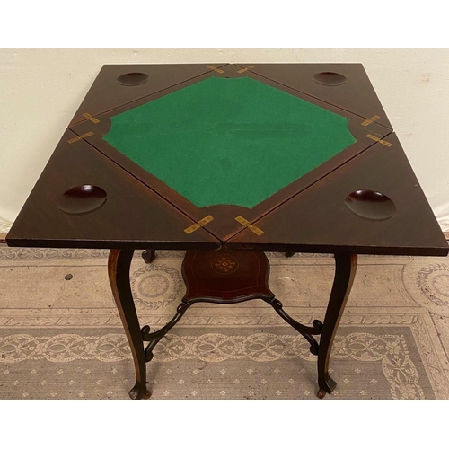 54 - AN ROSEWOOD INLAID ENVELOPE FOLD OVER CARD TABLE, a fine piece of Edwardian style furniture; the top... 