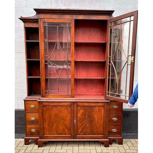 59 - AN IRISH GEROGIAN STYLE MAHOGANY BREAKFRONT LIBRARY BOOKCASE, a very fine piece of cabinetry with el... 