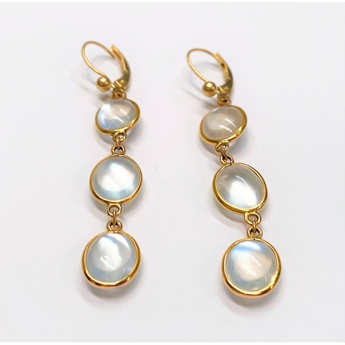 79 - A PAIR OF 14CT GOLD MOONSTONE DROP EARRINGS, featuring three moonstones each beautifully set in 14ct... 