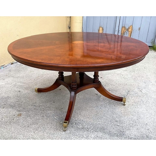 85 - A REGENCY STYLE MAHOGANY DINING SUITE; the suite is made up of a very good quality circular table, t... 