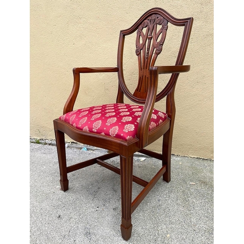 85 - A REGENCY STYLE MAHOGANY DINING SUITE; the suite is made up of a very good quality circular table, t... 