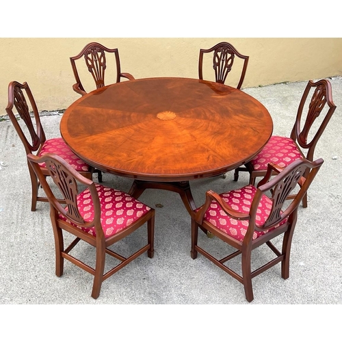 85 - A REGENCY STYLE MAHOGANY DINING SUITE; the suite is made up of a very good quality circular table, t... 