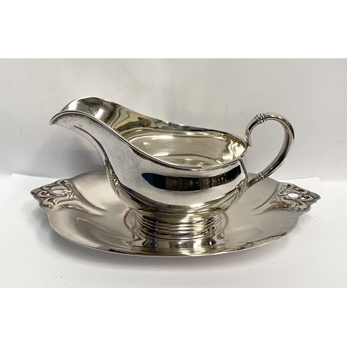 88 - A GOOD QUALITY ROYAL DANISH STERLING SILVER SAUCE BOAT AND TRAY, both marked International Sterling ... 