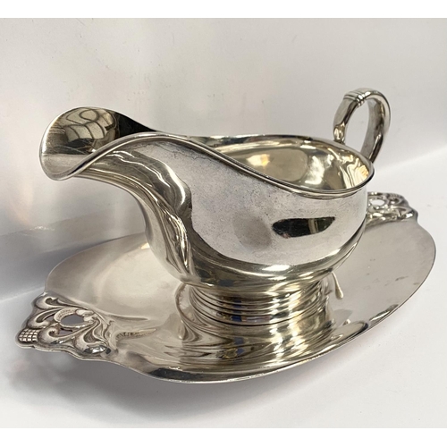 88 - A GOOD QUALITY ROYAL DANISH STERLING SILVER SAUCE BOAT AND TRAY, both marked International Sterling ... 