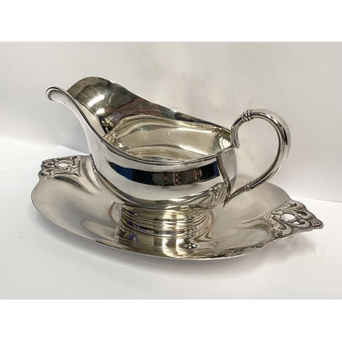 88 - A GOOD QUALITY ROYAL DANISH STERLING SILVER SAUCE BOAT AND TRAY, both marked International Sterling ... 