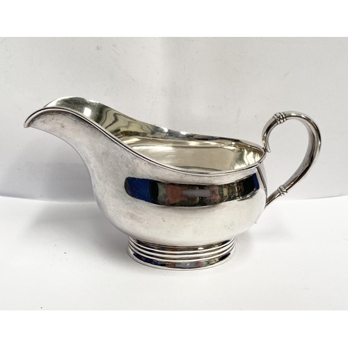 88 - A GOOD QUALITY ROYAL DANISH STERLING SILVER SAUCE BOAT AND TRAY, both marked International Sterling ... 