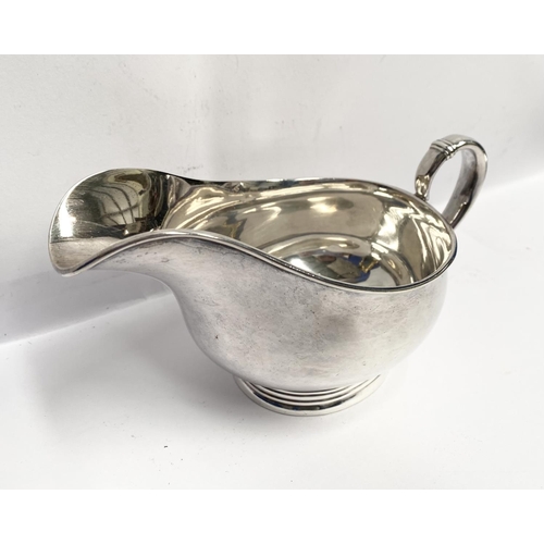 88 - A GOOD QUALITY ROYAL DANISH STERLING SILVER SAUCE BOAT AND TRAY, both marked International Sterling ... 