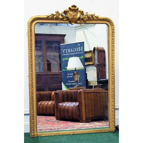 53 - A VERY FINE 19TH CENTURY GILT OVER MANTLE / HALL MIRROR, with gadrooned decoration to the curved fra... 