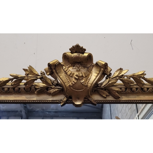 53 - A VERY FINE 19TH CENTURY GILT OVER MANTLE / HALL MIRROR, with gadrooned decoration to the curved fra... 