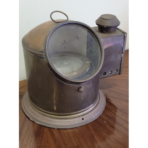 107 - A VINTAGE BRASS SESTREL BOAT/SHIPS COMPASS & BINNACLE,	the gimbaled compass is housed in a brass bin... 