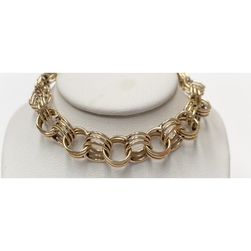 116 - A 14CT YELLOW GOLD MULTI-LAYERED GOLD LINK BRACELET, lovely gold tone and sits lightly on the wrist.