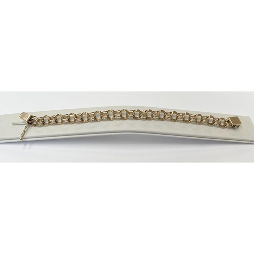 116 - A 14CT YELLOW GOLD MULTI-LAYERED GOLD LINK BRACELET, lovely gold tone and sits lightly on the wrist.