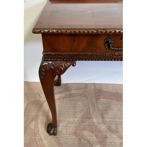 129 - A GOOD QUALITY MAHOGANY TWO DRAWER HALL TABLE, with crossbanding to top, gadrooned edge, standing on... 