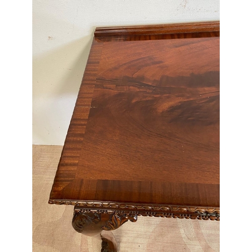 129 - A GOOD QUALITY MAHOGANY TWO DRAWER HALL TABLE, with crossbanding to top, gadrooned edge, standing on... 