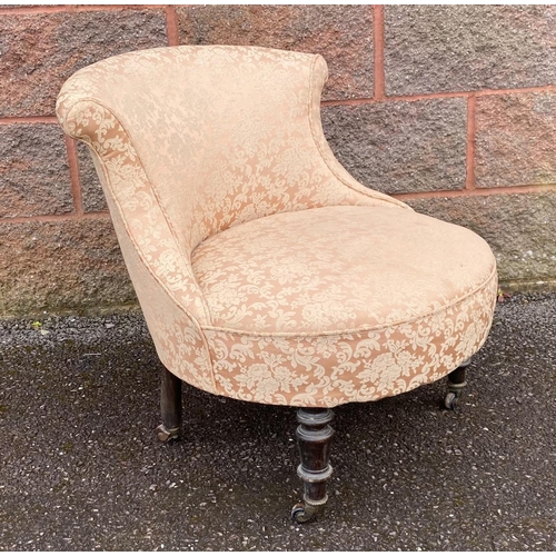 132 - A 19TH CENTURY CIRCULAR UPHOLSTERED NURSING CHAIR, on turned leg with castors, Dimensions: 64cm high... 