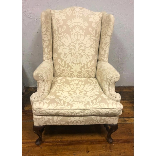 137 - A FINE GEORGIAN MAHOGANY FRAMED WINGBACK ARMCHAIR, in traditional form; with short cabriole shaped f... 