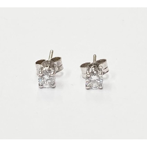 141 - A CLASSIC PAIR OF 18CT WHITE GOLD DIAMOND STUD EARRINGS, each stud is a round brilliant cut diamond,... 