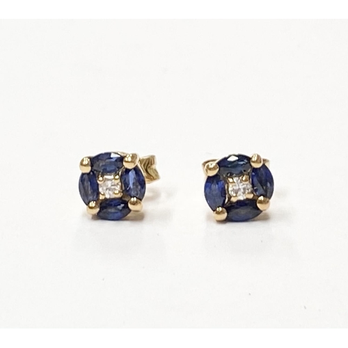 142 - AN ELEGANT PAIR OF 18CT YELLOW GOLD SAPPHIRE & DIAMOND STUD EARRINGS; each stud earring is made up o... 