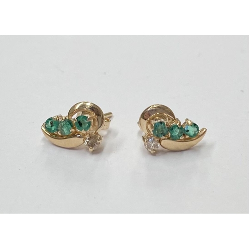 143 - AN ELEGANT PAIR OF 14CT YELLOW GOLD EMERALD & DIAMOND CROSSOVER STYLE EARRINGS; each earring with 3 ... 