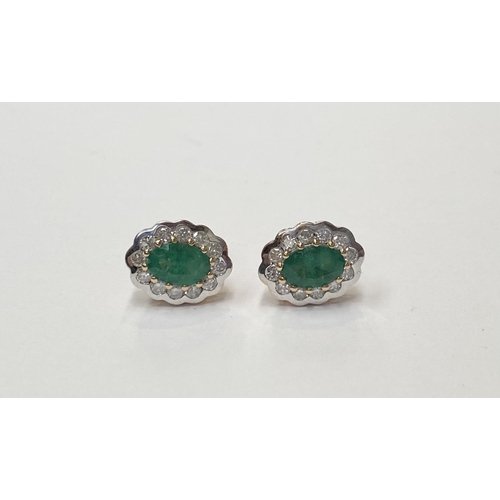 153 - A PAIR OF 18CT YELLOW GOLD COLOMBIAN EMERALD & DIAMOND CLUSTER EARRINGS, these magnificent earrings ... 