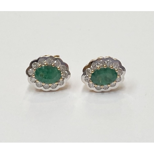 153 - A PAIR OF 18CT YELLOW GOLD COLOMBIAN EMERALD & DIAMOND CLUSTER EARRINGS, these magnificent earrings ... 