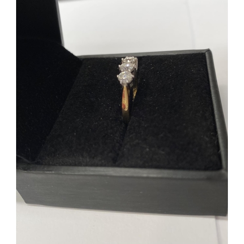 167 - AN 18CT YELLOW GOLD THREE STONE DIAMOND RING, set with three round brilliant cut diamonds, total .90... 