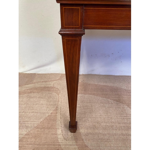 168 - A MAHOGANY INLAID WINDOW SEAT, upholstered, standing on tapered inlaid leg. Dimensions: 96cm x 40cm ... 