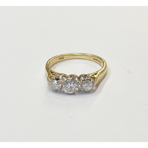 170 - AN 18CT YELLOW GOLD THREE STONE DIAMOND RING, the diamond weight is .60 cts in total , colour G , cl... 