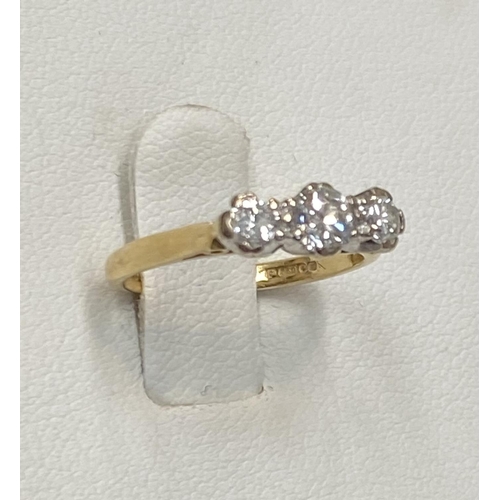 170 - AN 18CT YELLOW GOLD THREE STONE DIAMOND RING, the diamond weight is .60 cts in total , colour G , cl... 