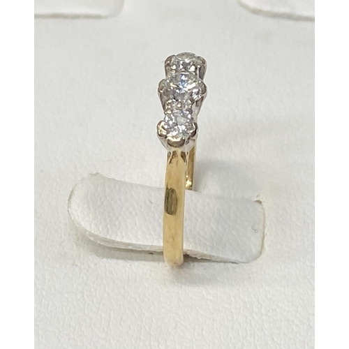 170 - AN 18CT YELLOW GOLD THREE STONE DIAMOND RING, the diamond weight is .60 cts in total , colour G , cl... 