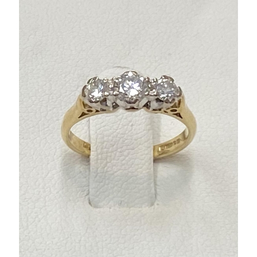 170 - AN 18CT YELLOW GOLD THREE STONE DIAMOND RING, the diamond weight is .60 cts in total , colour G , cl... 