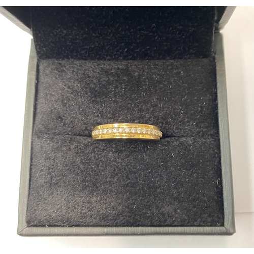 185 - AN 18 CT YELLOW GOLD HALF ETERNITY DIAMOND RING, the 16 diamonds are claw set , ring size M