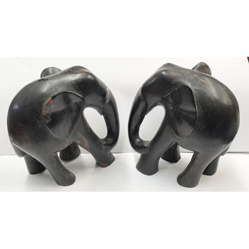 186 - A PAIR OF ANTIQUE LARGE HAND CARVED EBONY ELEPHANTS, with bone inlay to eyes, Dimensions: 23cm high ... 