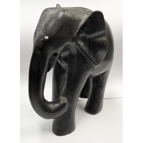 186 - A PAIR OF ANTIQUE LARGE HAND CARVED EBONY ELEPHANTS, with bone inlay to eyes, Dimensions: 23cm high ... 