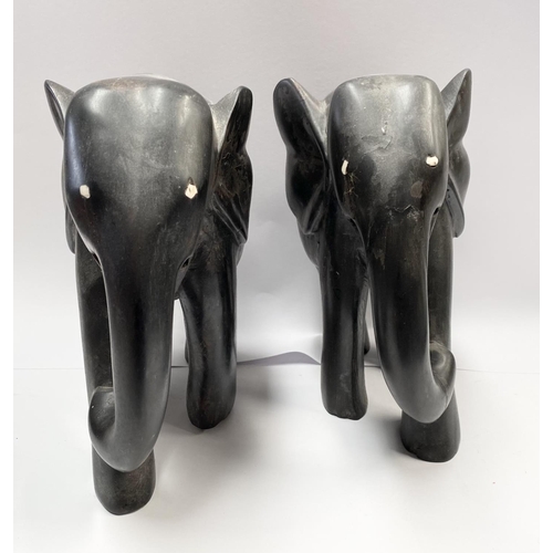 186 - A PAIR OF ANTIQUE LARGE HAND CARVED EBONY ELEPHANTS, with bone inlay to eyes, Dimensions: 23cm high ... 