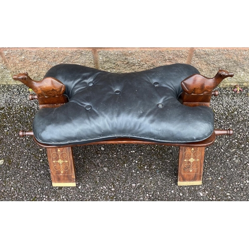 188 - A CARVED ROSEWOOD AND LEATHER FOOT STOOL, c.1960, with marquetry inlay, tufted leather cushion and c... 