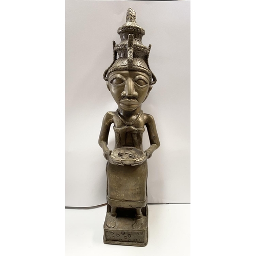 190 - AN ANTIQUE NIGERIAN CAST METAL STATUE, a female figure with traditional headdress, carrying a bowl, ... 