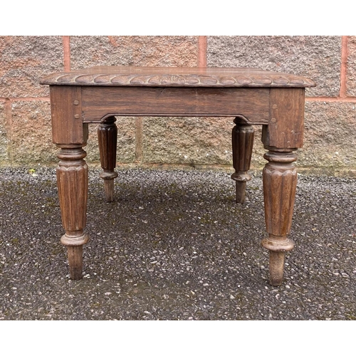 193 - A LATE 19TH CENTURY MAHOGANY SQUARE SIDE/COFFEE TABLE, having a gadroon edge, standing on turned leg... 