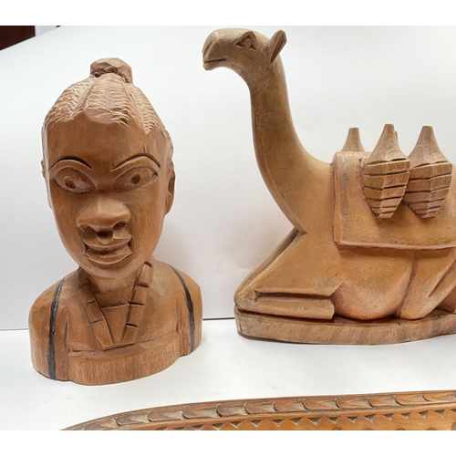 195 - AN ASSORTED COLLECTION OF CARVED WOODEN AFRICAN PIECES, to include (i) a pair of wood carved figural... 