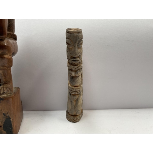 196 - AN ASSORTED COLLECTION OF CARVED WOODEN AFRICAN PIECES, to include (i) carved wood male figure holdi... 