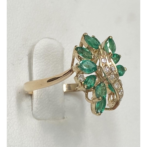 20 - A BEAUTIFUL 14CT YELLOW GOLD EMERALD & DIAMOND COCKTAIL RING, the movement in the design of this pie... 