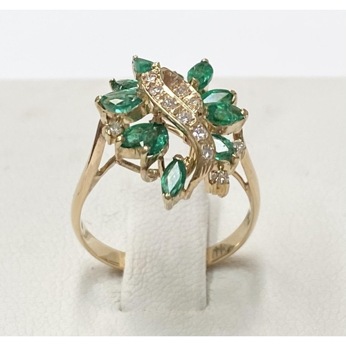 20 - A BEAUTIFUL 14CT YELLOW GOLD EMERALD & DIAMOND COCKTAIL RING, the movement in the design of this pie... 