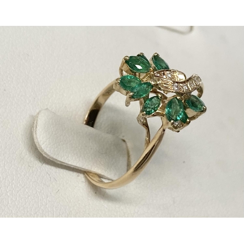 20 - A BEAUTIFUL 14CT YELLOW GOLD EMERALD & DIAMOND COCKTAIL RING, the movement in the design of this pie... 