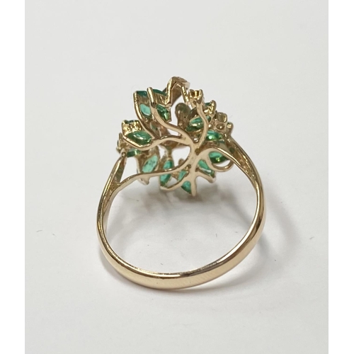 20 - A BEAUTIFUL 14CT YELLOW GOLD EMERALD & DIAMOND COCKTAIL RING, the movement in the design of this pie... 